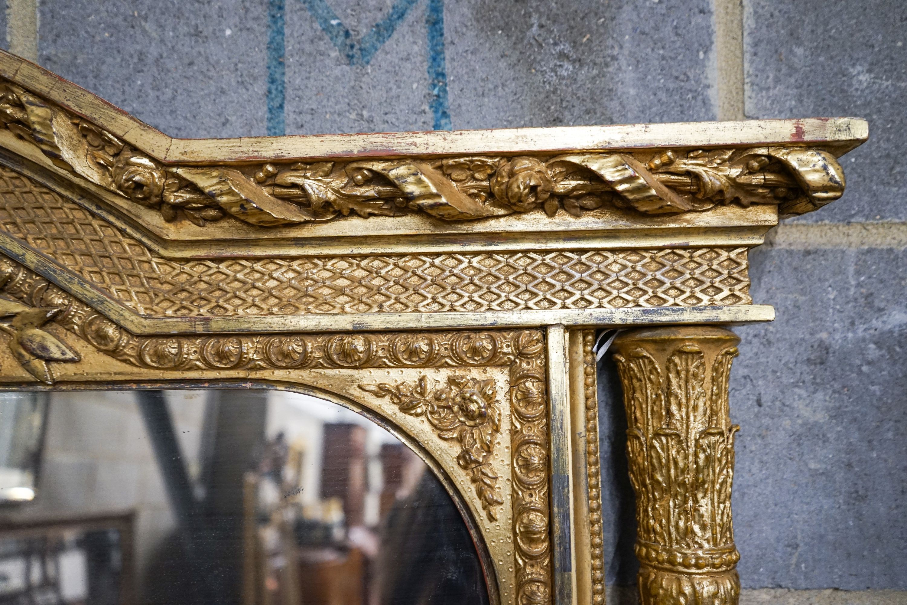 A Victorian carved giltwood and gesso overmantel mirror, the plate flanked by fluted columns, width 155cm, height 178cm